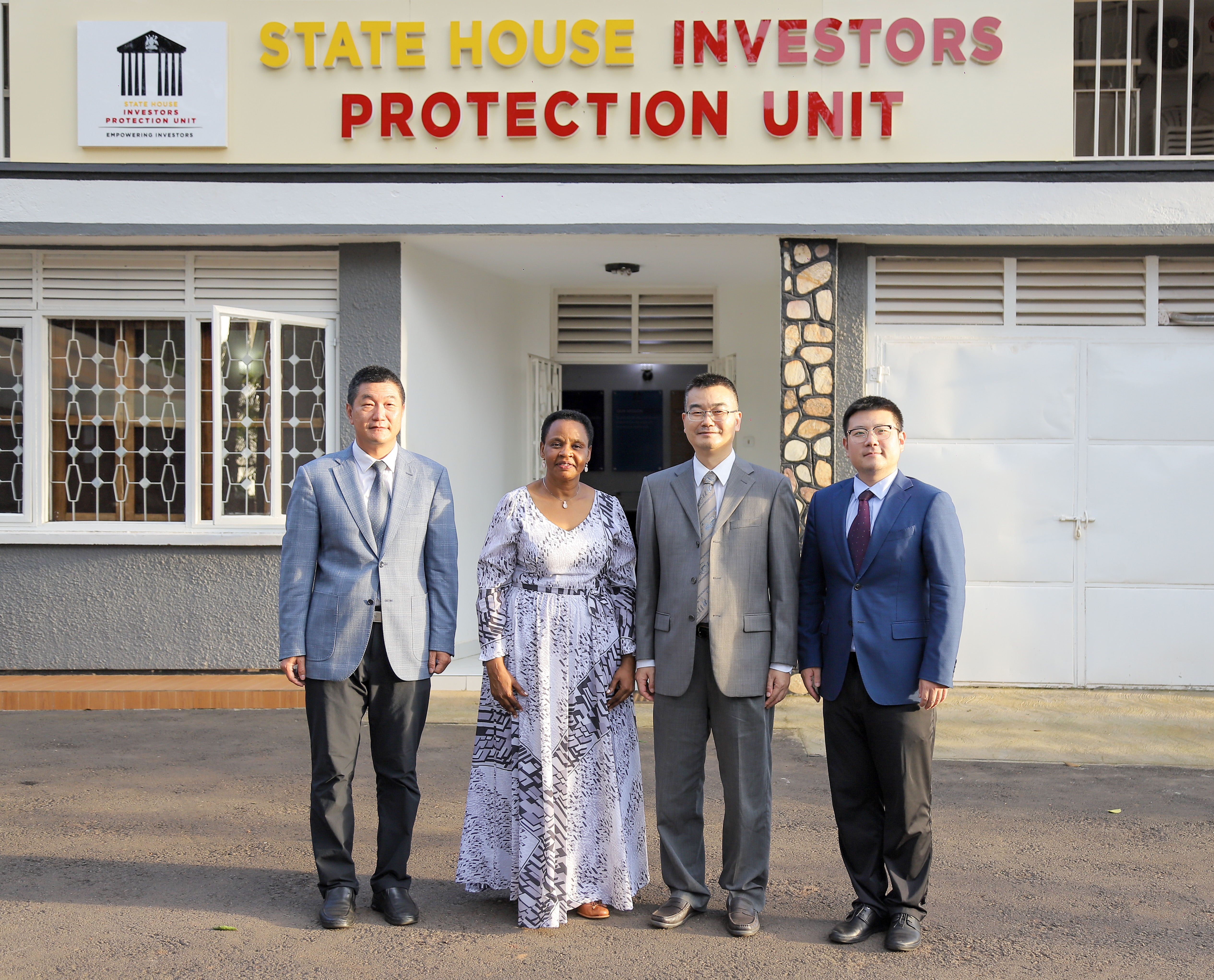 Chinese Minister Counsellor Mr. Xuecheng Fan and his Senior Officials take a group photo with Col. Edith Nakalema