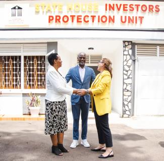 The Head of Unit interacting with Honourable Emek Eker and Senior Journalist Andrew Mwenda